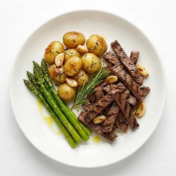 Grilled Steak Strips with Garlic Baby Potatoes & Asparagus